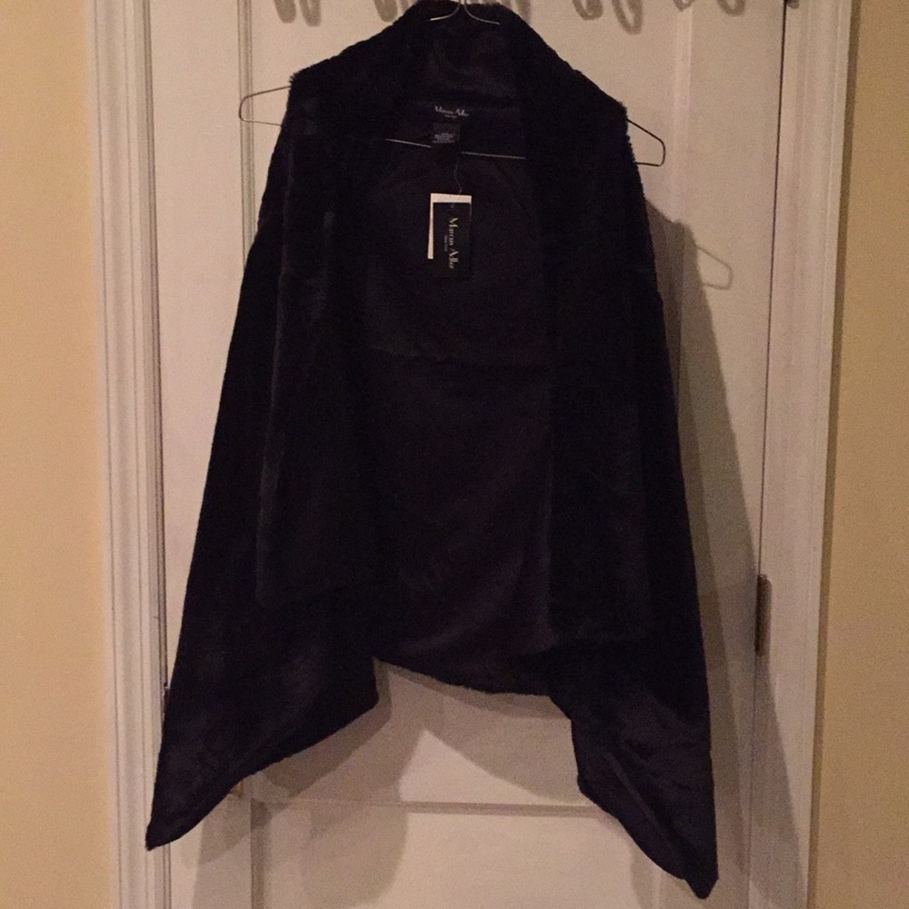 Black Faux fur vest.